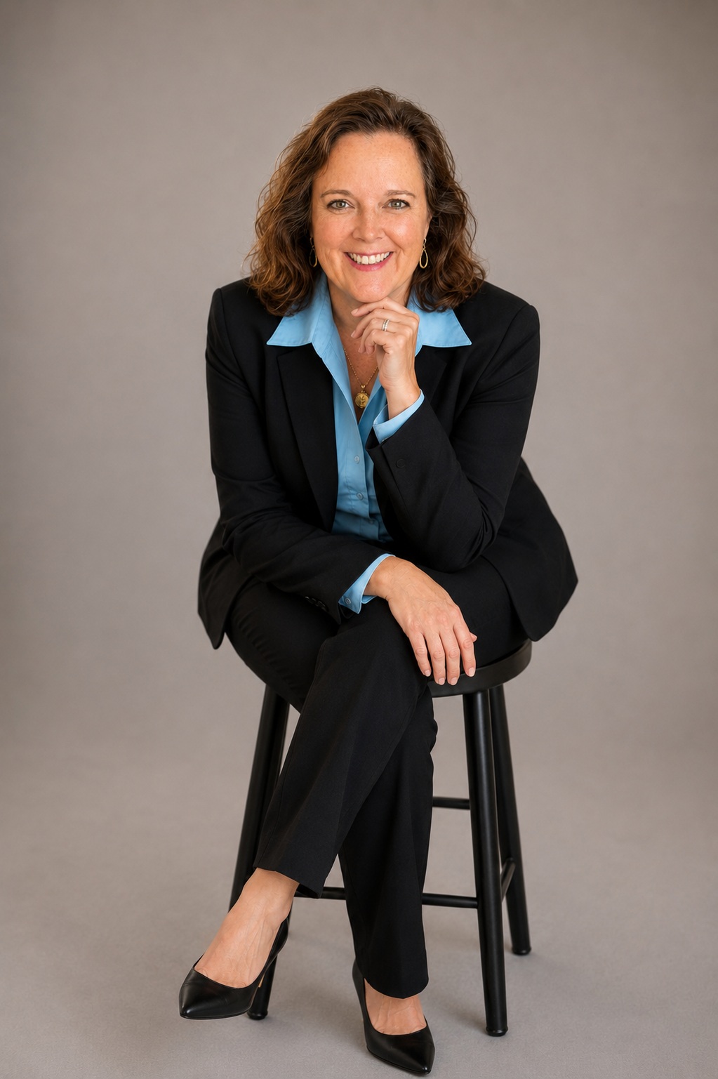 Melinda Klotz Mercer seated in a professional portrait